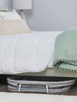 Baby Basics™ Infant Bassinet collapses for easy storage